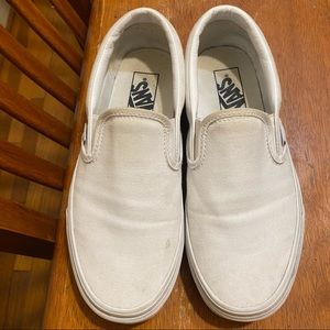 Vans white slip ons